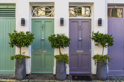 Painted front entrance with decorative accents
